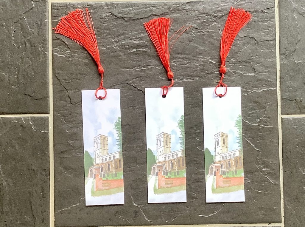 Three bookmarks, with smart red tassel